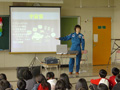Astronaut Sumino giving lecture in Hanakawa-Minami Elementary School