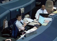 Photo:Astronaut Hoshide communicating with the STS-130 crew members