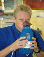 Former ESA astronaut Thomas Reiter undertaking science activities for the Nitric Oxide Analyzer (NOA) experiment in 2006.  (Image:  ESA)