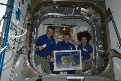 Expedition 26/27 crew members and their paper cranes