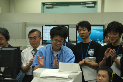 MAXI Project team members monitor initial activation of MAXI at UOA, Principle Investigator Masaru Matsuoka, Riken (back left)