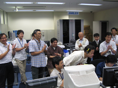 SEDA-AP Project team members monitor initial activation of SEDA-AP at UOA, Principal Investigator Goka Tateo, JAXA (back, fourth from right)
