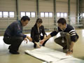 Astronauts Furukawa, Sumino, and Hoshide (from left) preparing for diving