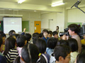 Astronaut Sumino giving lecture in Hanakawa-Minami Elementary School