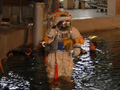 Astronaut Hoshide entering the pool at the Hydro Laboratory