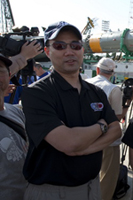Astronaut Noguchi answering questions from reporters at the Baikonur Cosmodrome (Credit: JAXA)