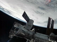 ISSへ結合されたドラゴン補給船運用1号機（出典：JAXA/NASA）
