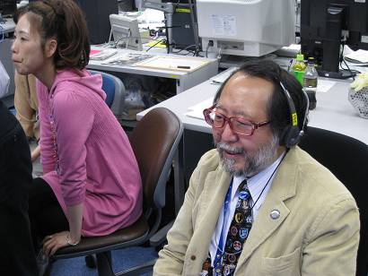 Professor Majima (right) monitoring the experiment at User Operations Area (UOA) of TKSC
