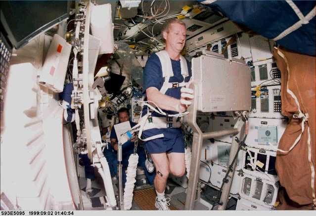 astronauts exercise in space