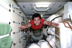 Astronaut Wakata floating inside 'Zarya'